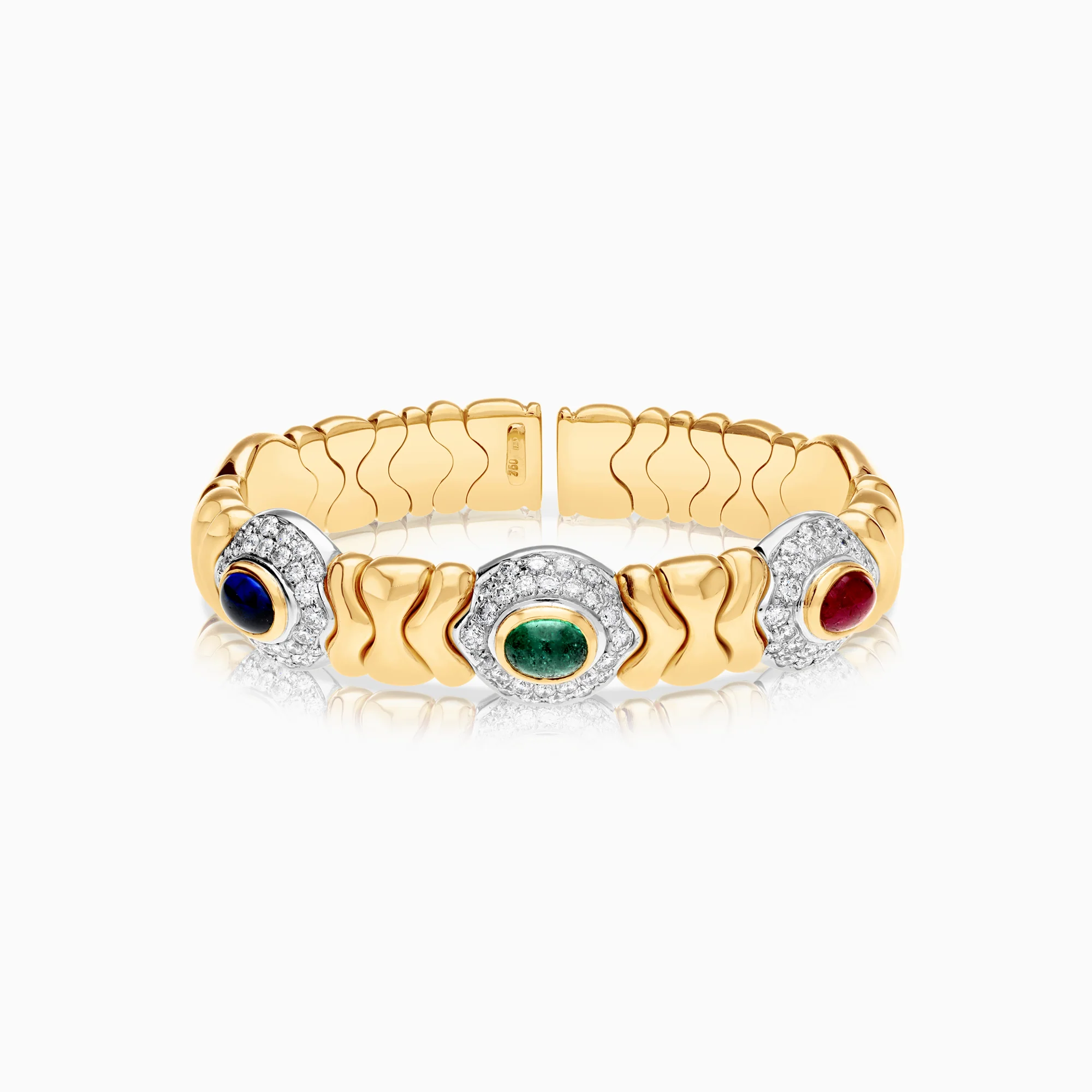 Gemstone bracelet sapphires, rubies and emeralds 72.39g 18K gold