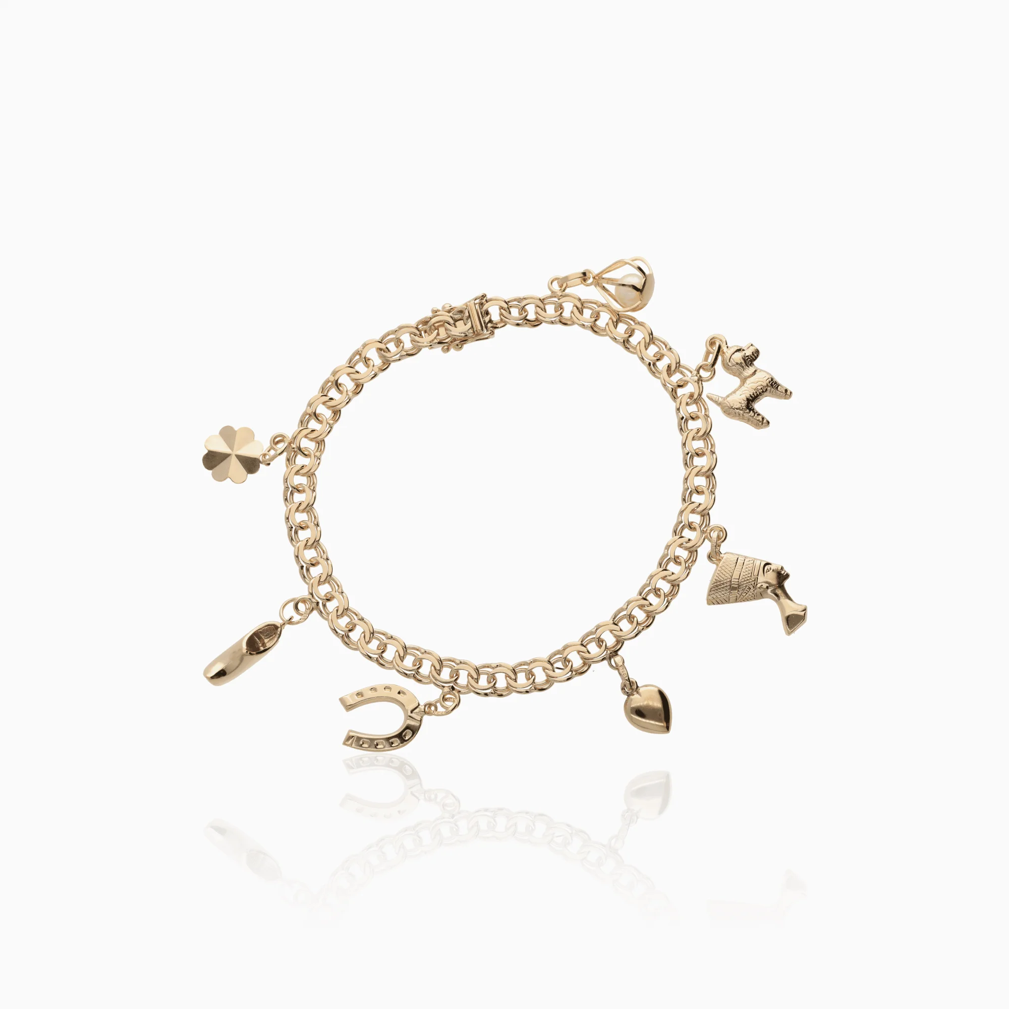 Bismarck bracelet with charms 17.38g 18K gold