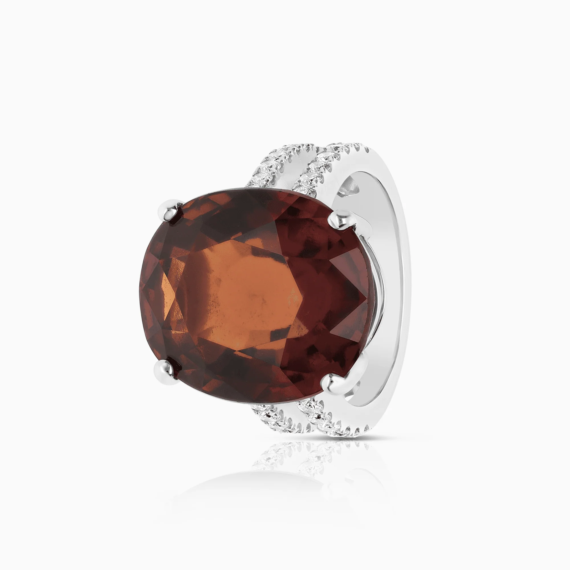Cocktail ring with 0.62ct diamonds & a 19.86ct red/orange garnet