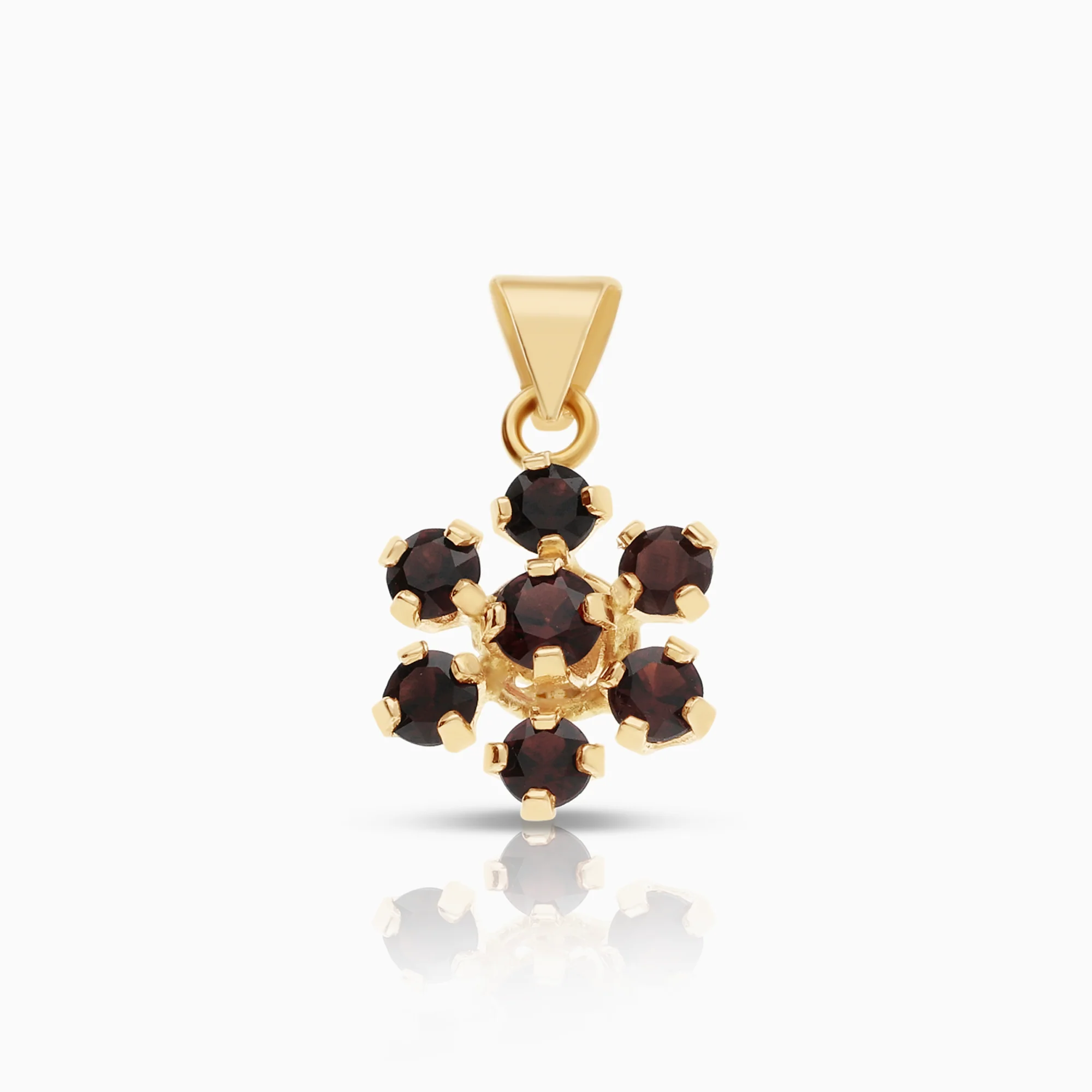 Pendant 0.84g 18K gold with 7 garnets