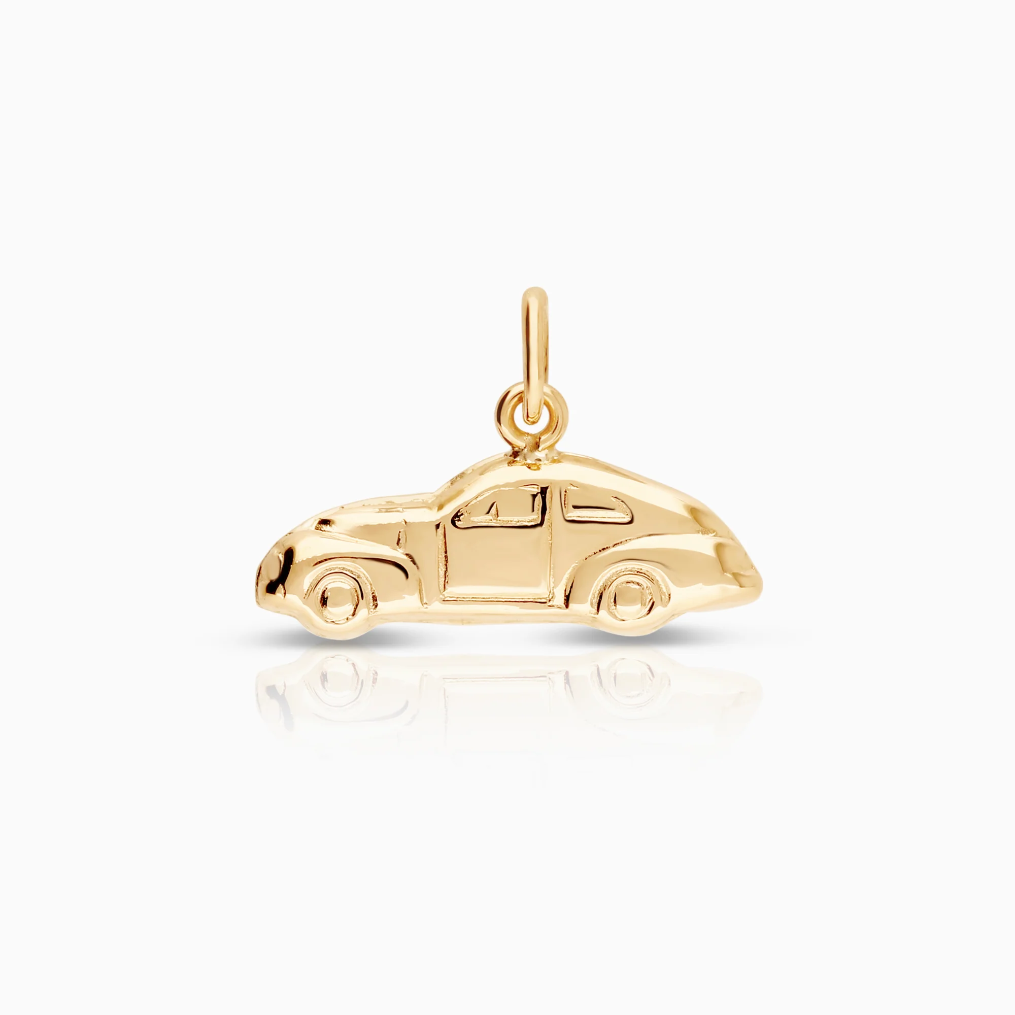 Car pendant 0.56g 18K gold