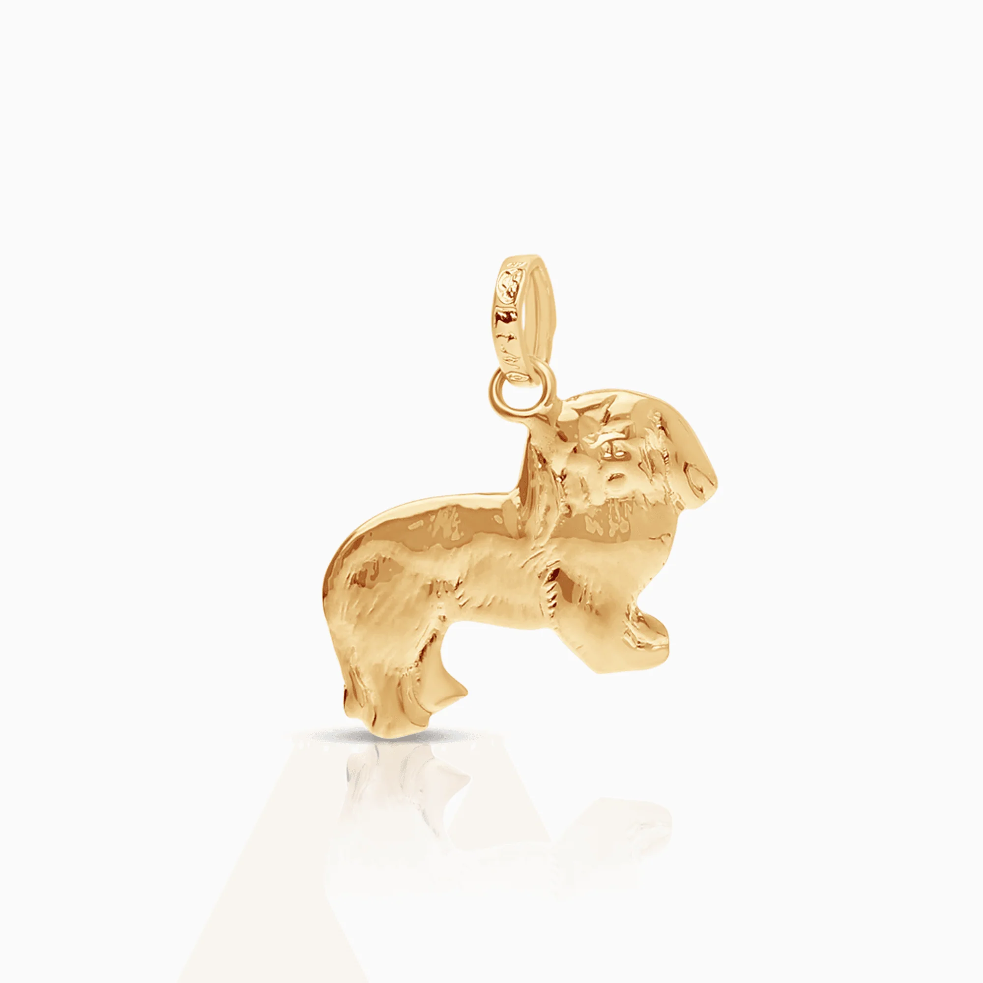 Dog pendant 0.93g 18K gold