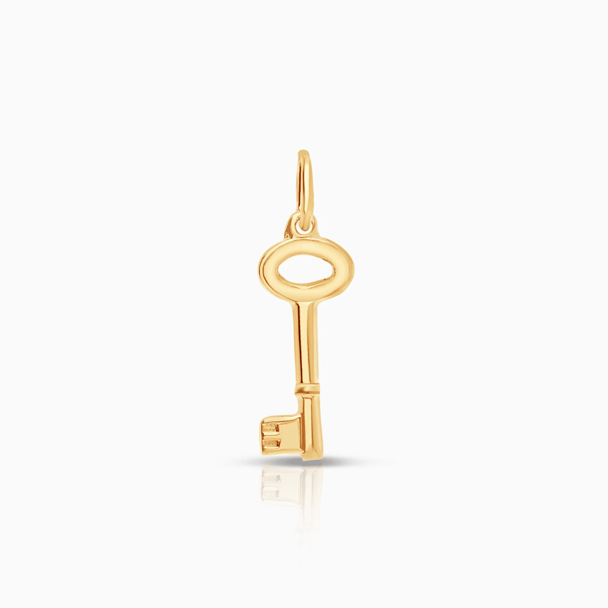Key pendant 0.34g 18K gold