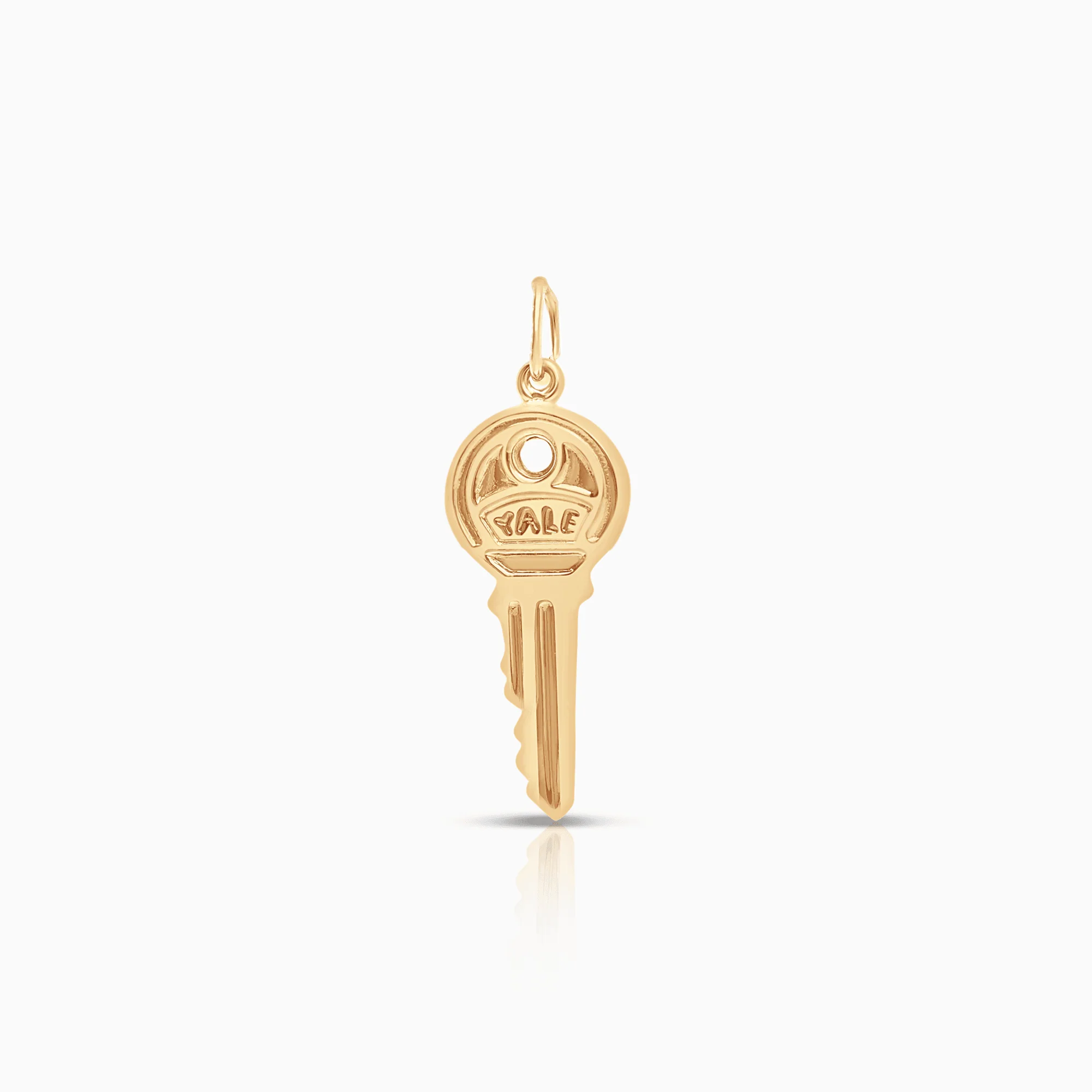 Key pendant 0.65g 18K gold