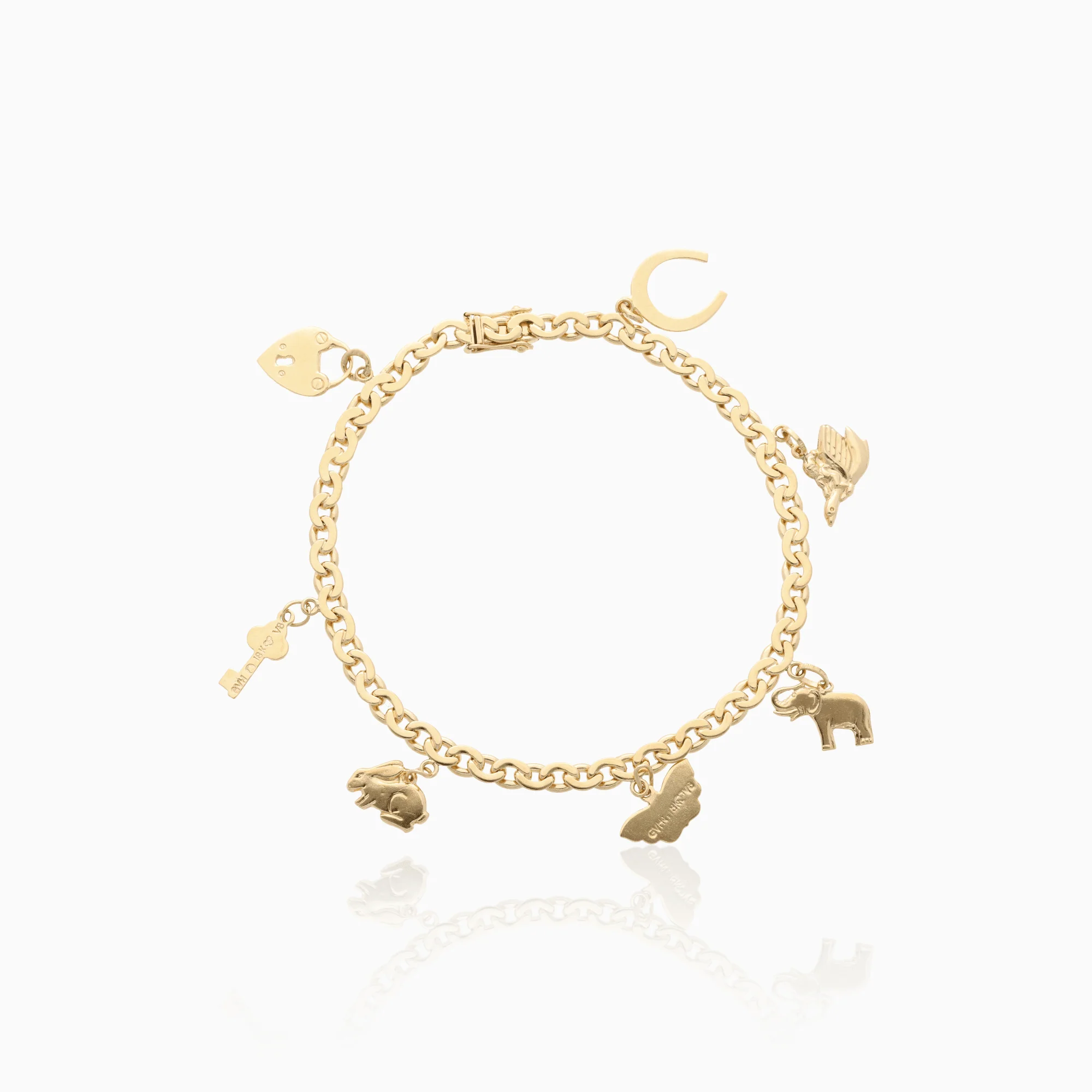 S-link bracelet with charms 16.8g 18K gold