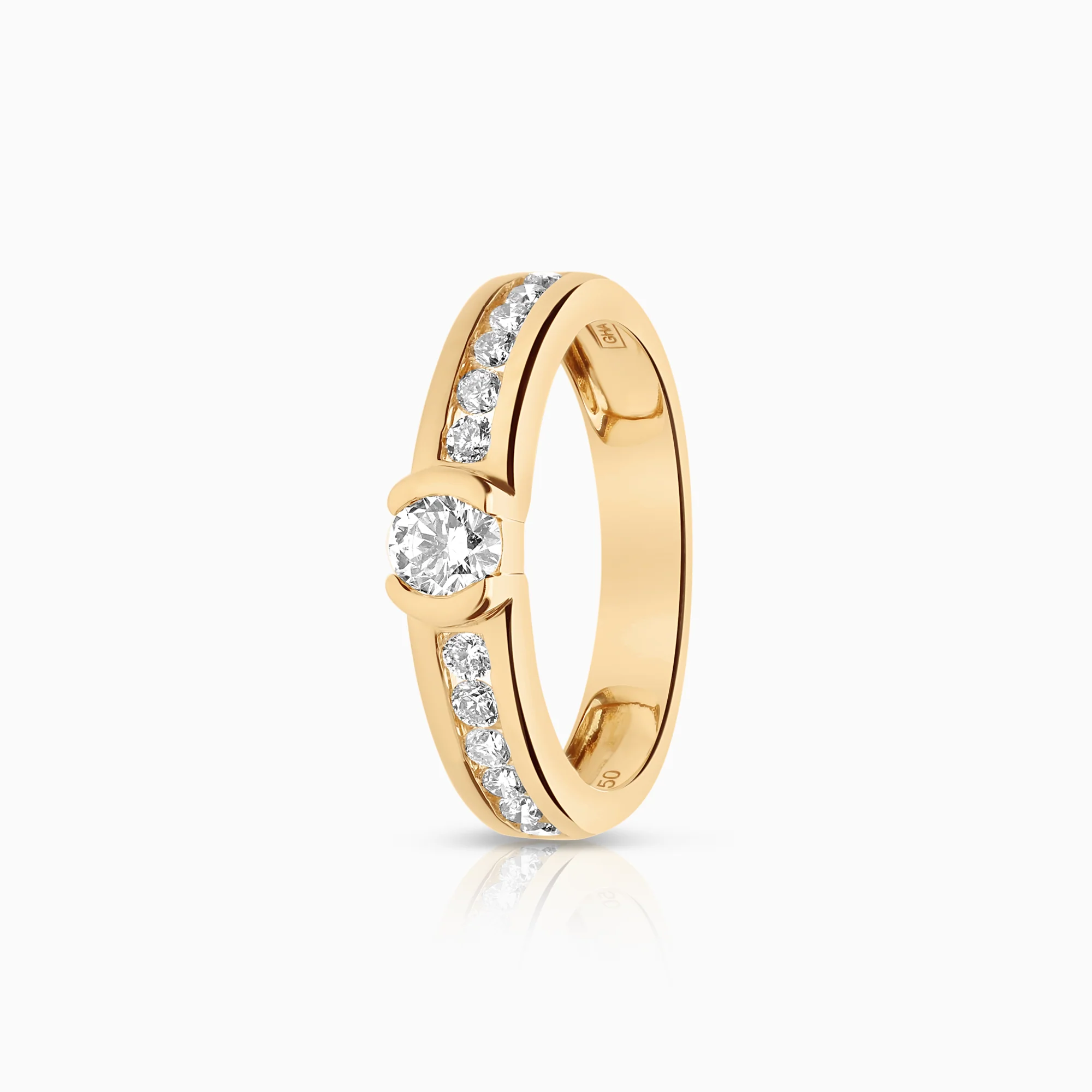 Side-stone ring 0.50ct 18K gold