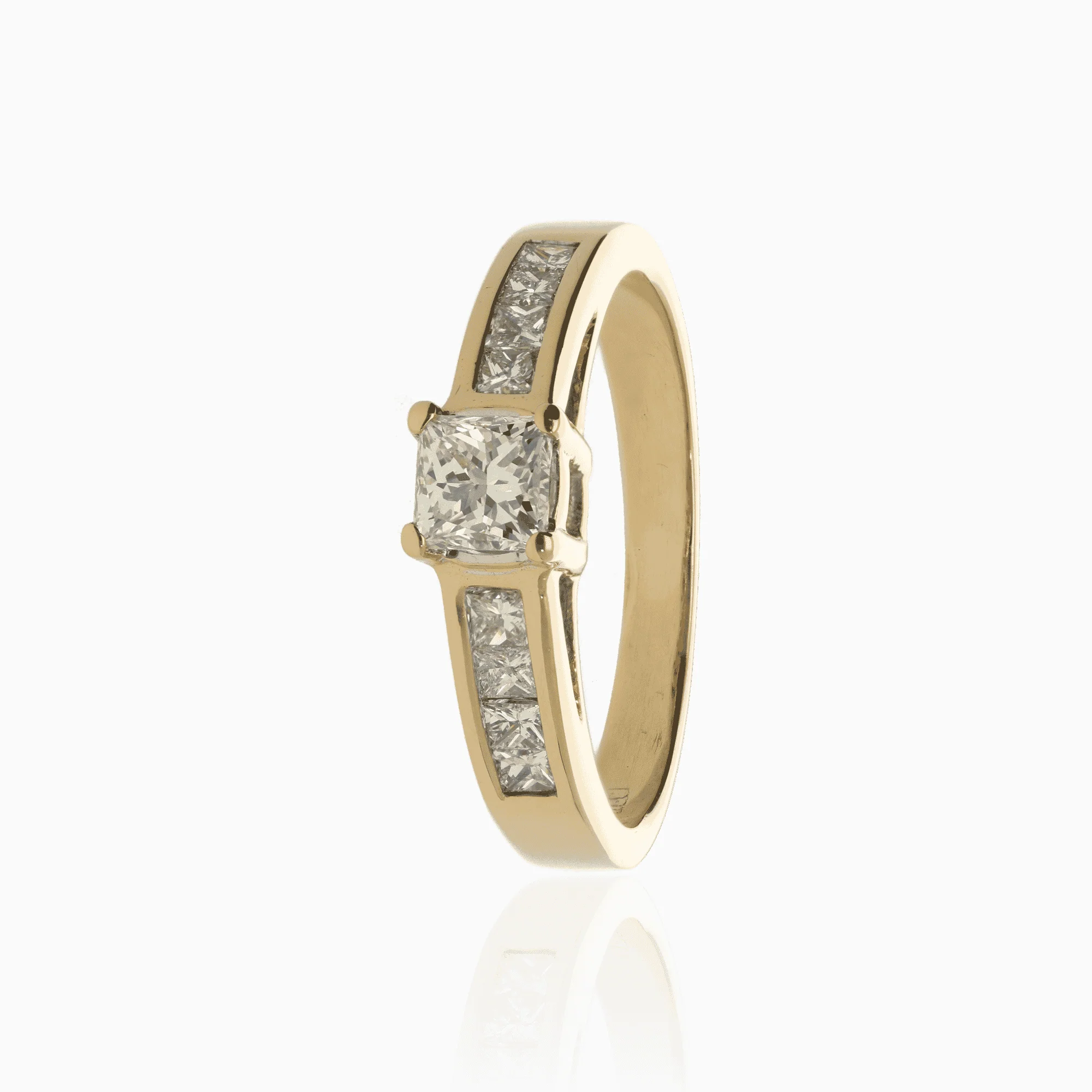 Side stone ring 0.56ct 18K