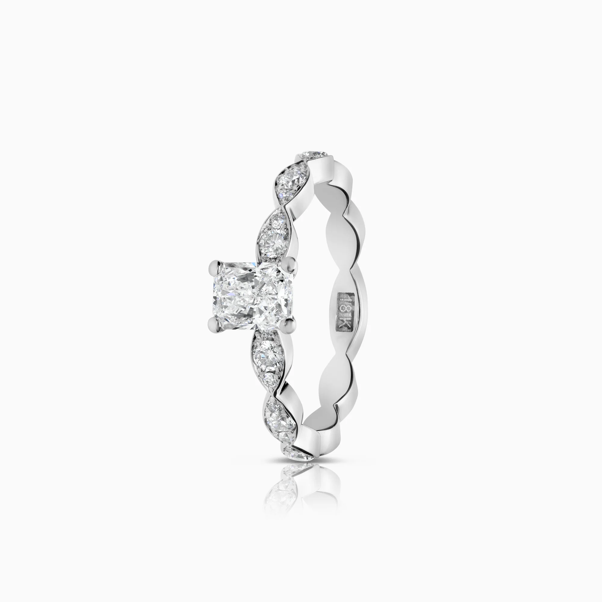 Side stone ring 0.74ct 18K white gold