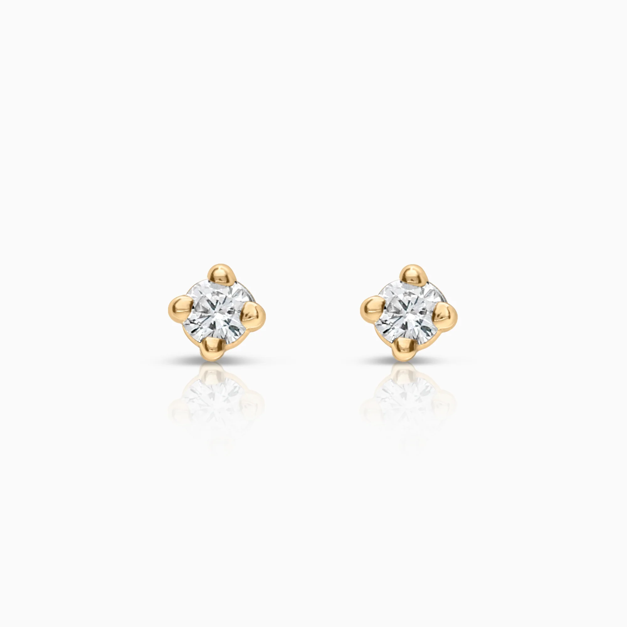 Solitaire earrings 0.04ct 18K gold
