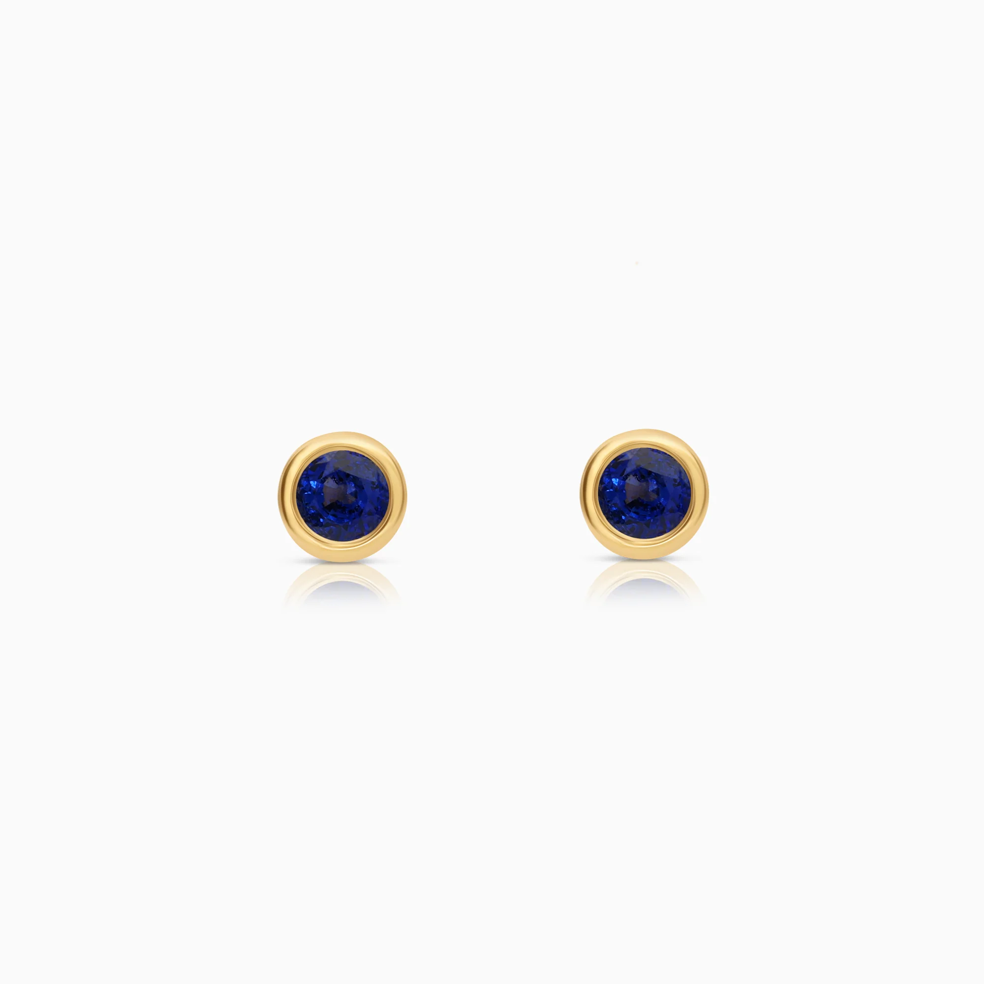 Solitaire earrings with blue sapphires 18K gold